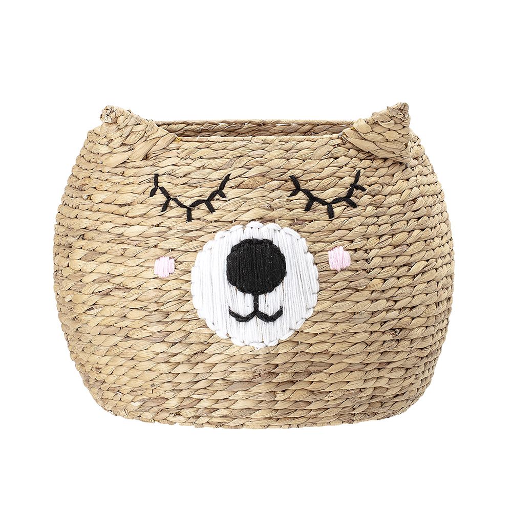 a sleeping bear-shaped basket