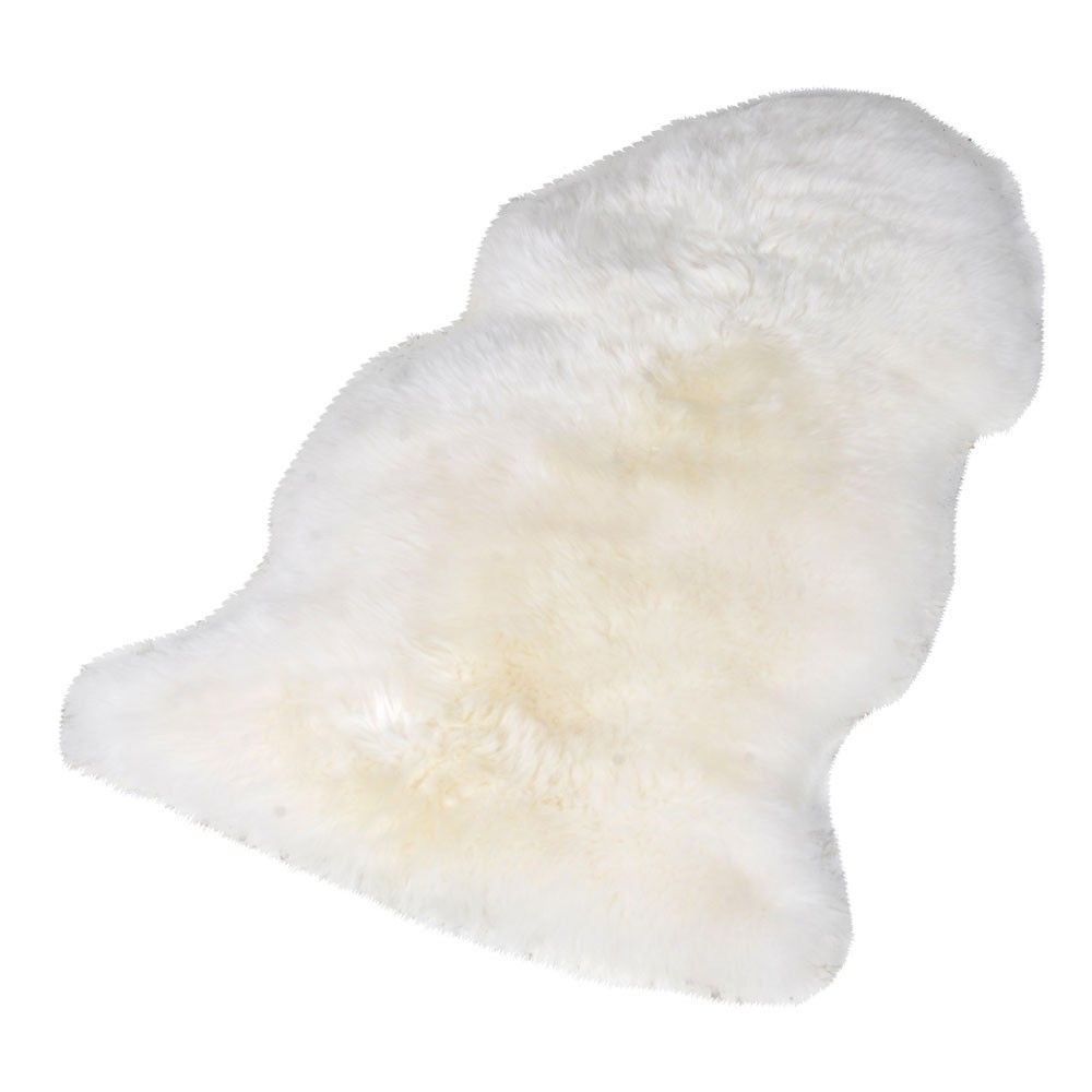 an ivory-coloured natural sheepskin rug