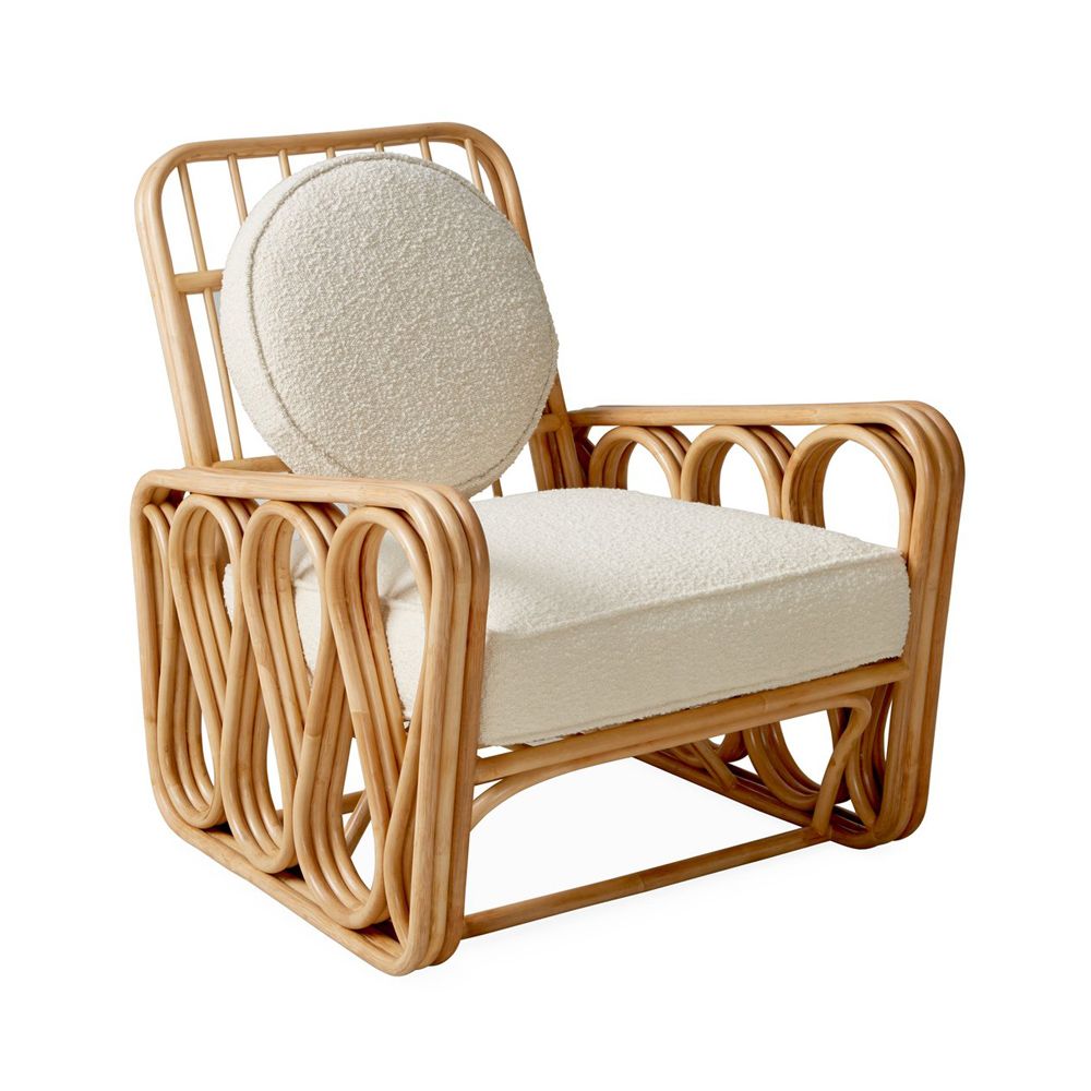 luxurious rattan and boucle armchair