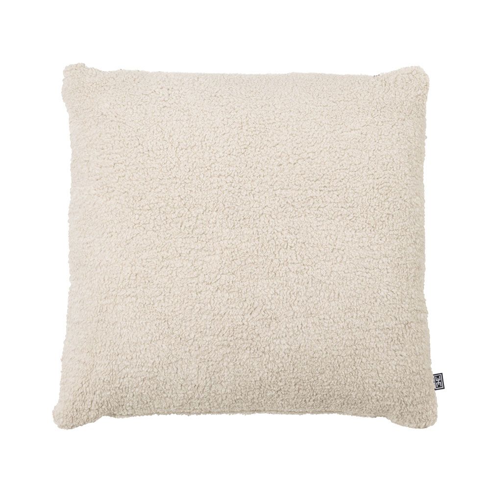 fluffy cream-coloured cushion