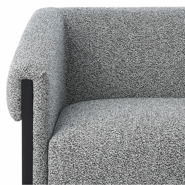 A contemporary chair with a gorgeous grey upholstery and black wood finish