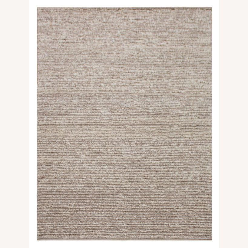Hand woven wool rug in brown/beige shade