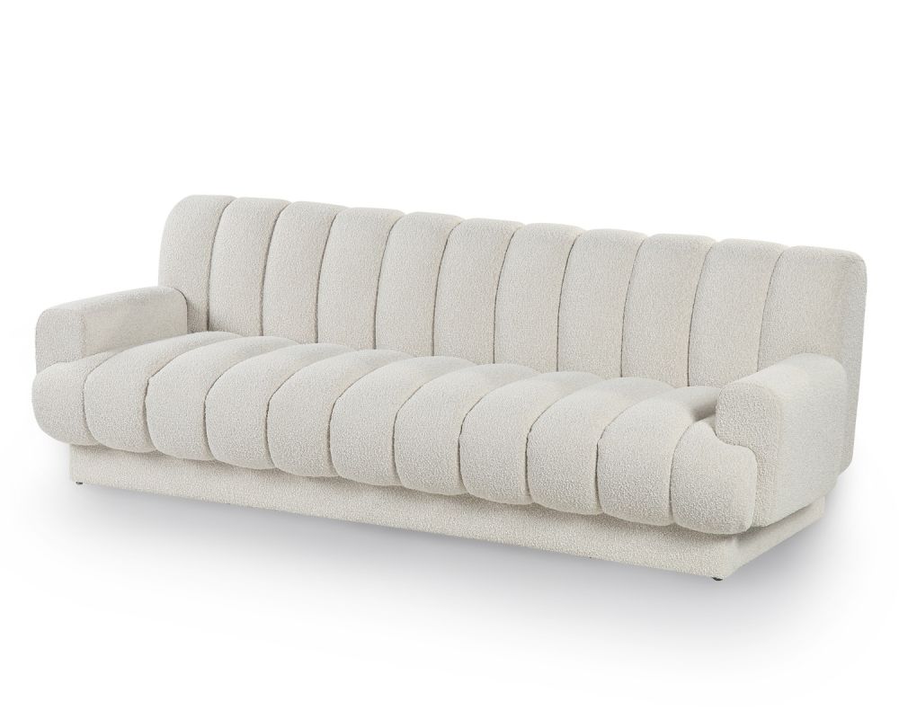 A contemporary sofa with a beautiful boucle upholstery and channel stitching