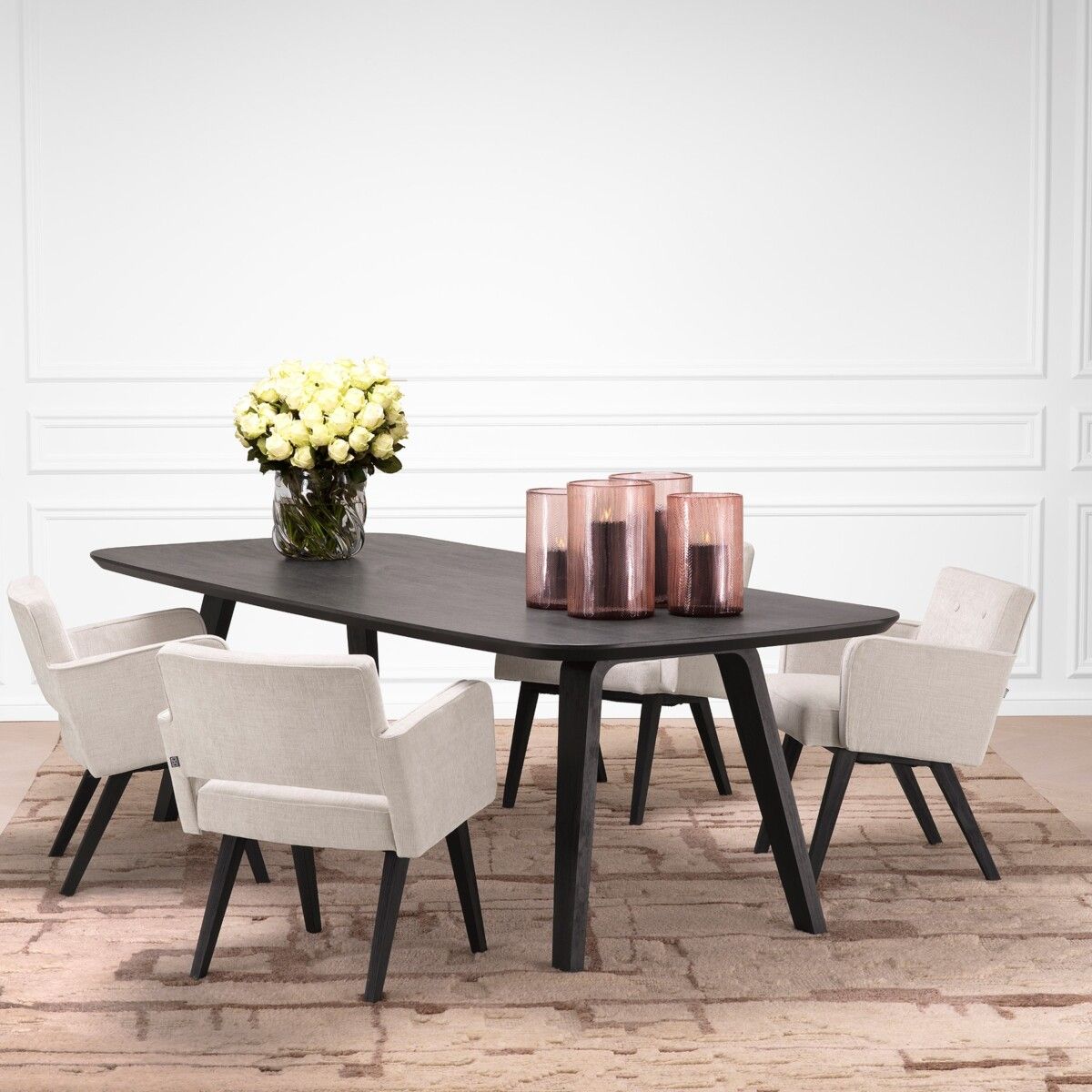 Sleek black rectangular dining table with curved edges