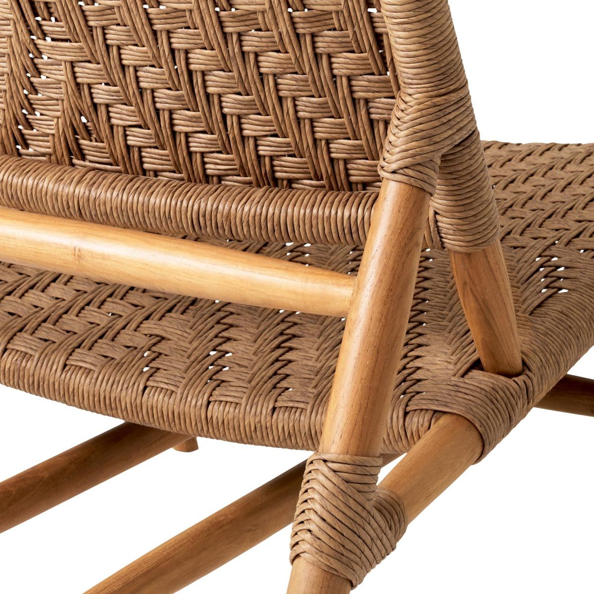 A stylish rattan outdoor chair and footstool by Eichholtz 