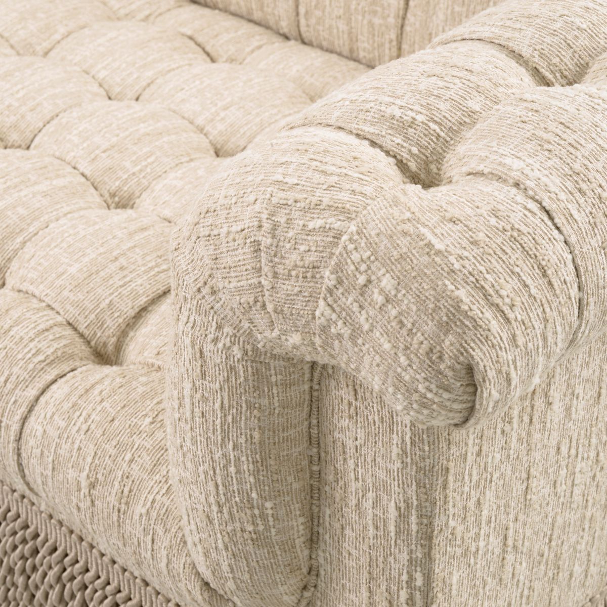 Classic opulent style sofa with a tasseled base