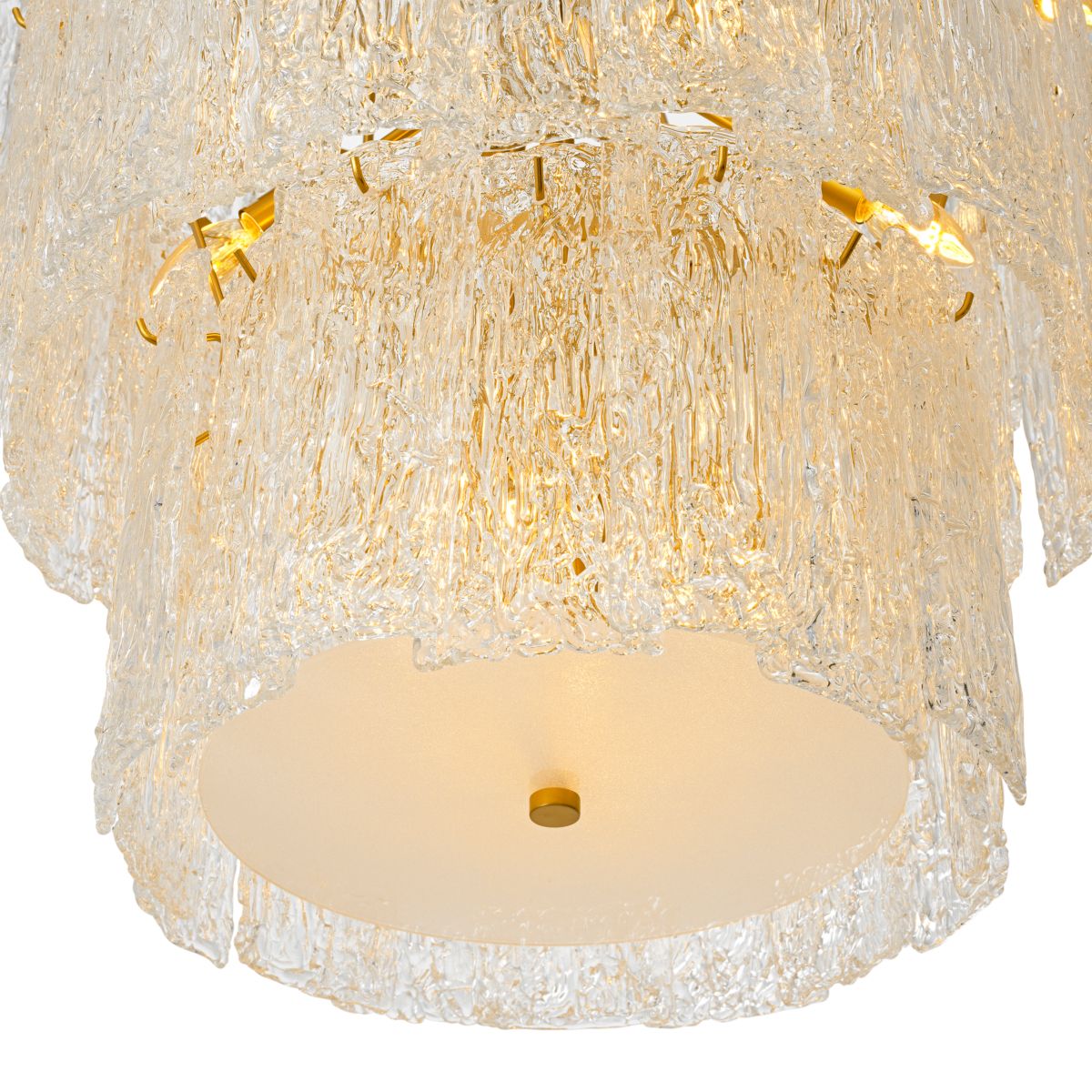 Divine and opulent chandelier featuring textured layered grass and brushed brass accents