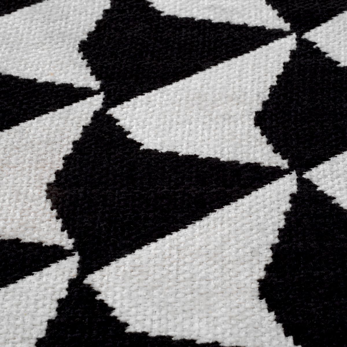 Striking chair featuring black and white geometric design