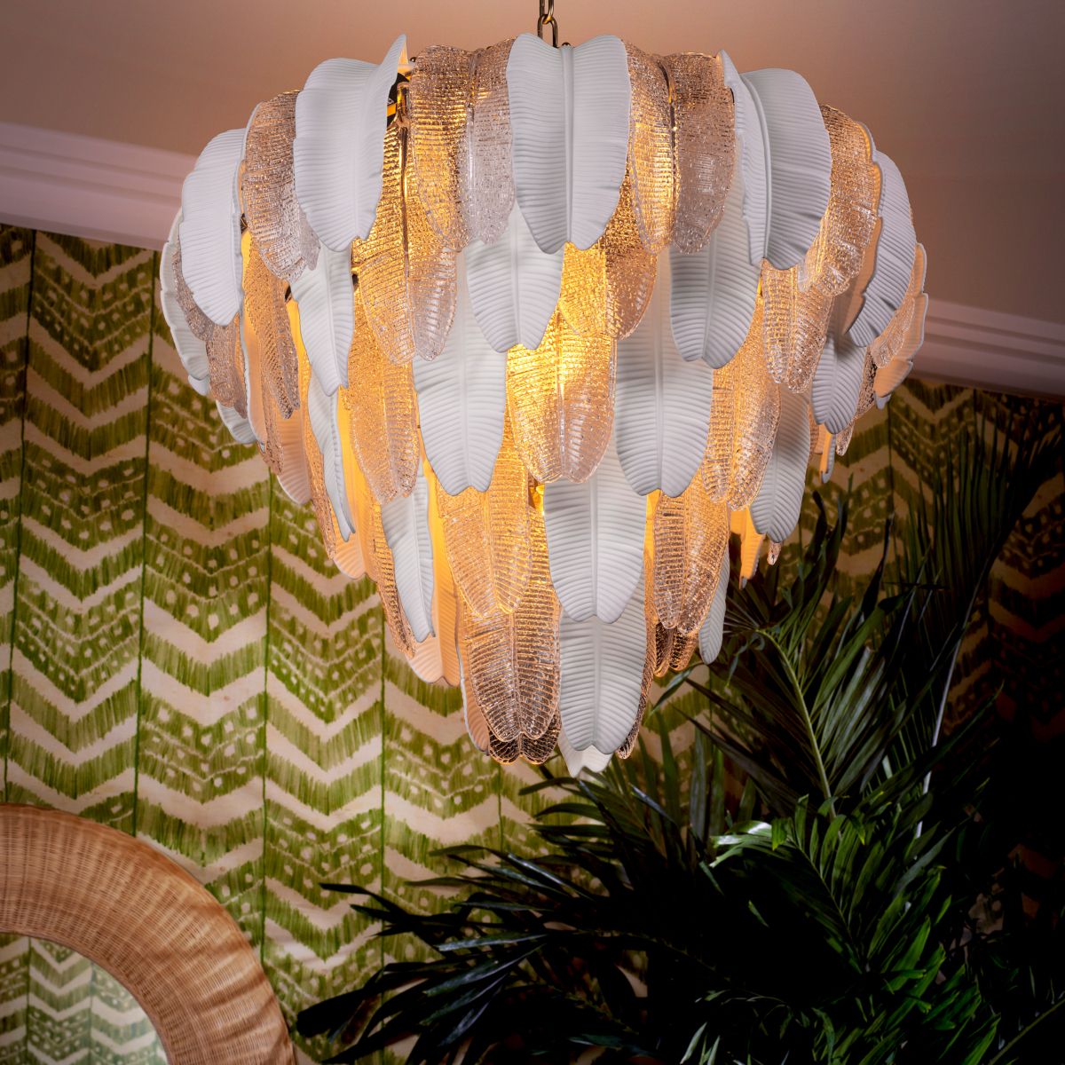 Inspired by the banana tree, the Saint Lucia Chandelier blends ceramic and textured glass, creating a unique and elegant focal point.
