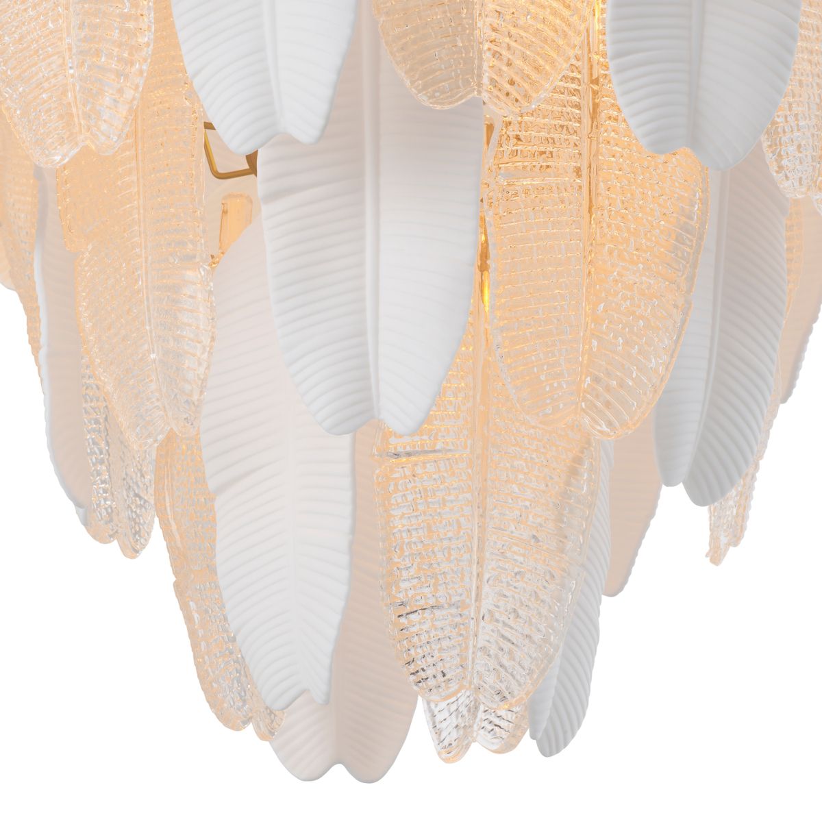 Inspired by the banana tree, the Saint Lucia Chandelier blends ceramic and textured glass, creating a unique and elegant focal point.