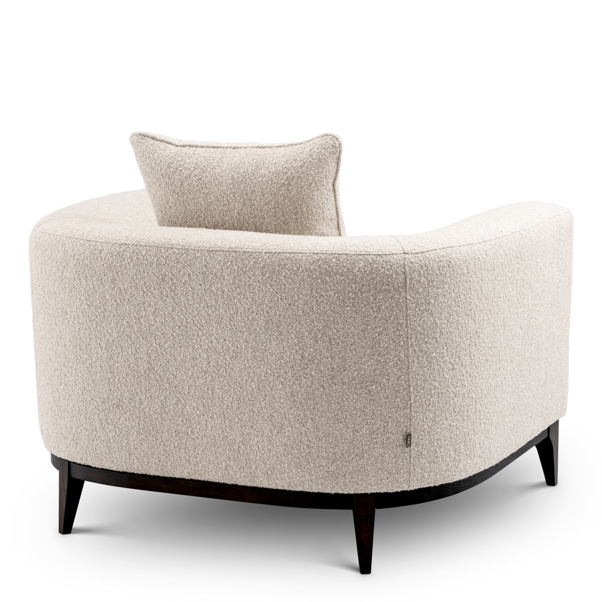 Sleek armchair in boucle cream finish with contrasting black base.