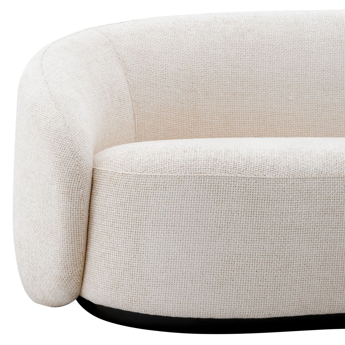 Off white sofa with curved back and a sleek black base