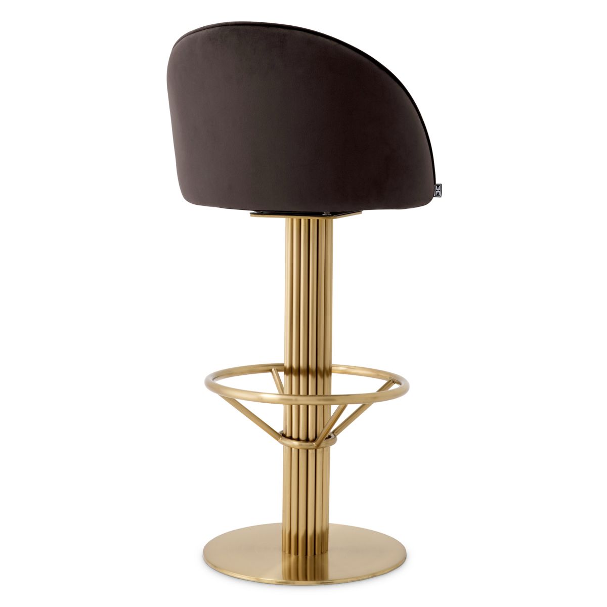 Contemporary bar stool with brass finish base and velvet grey seat