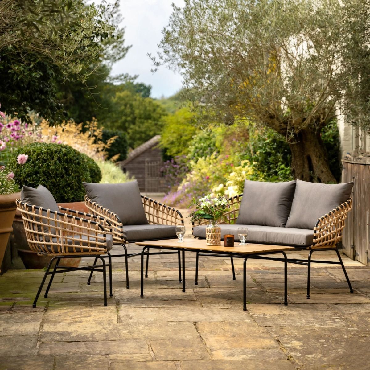 Elevate your outdoor space with the Sceania Outdoor Lounge Set, featuring stylish design and durable materials for ultimate comfort and relaxation.