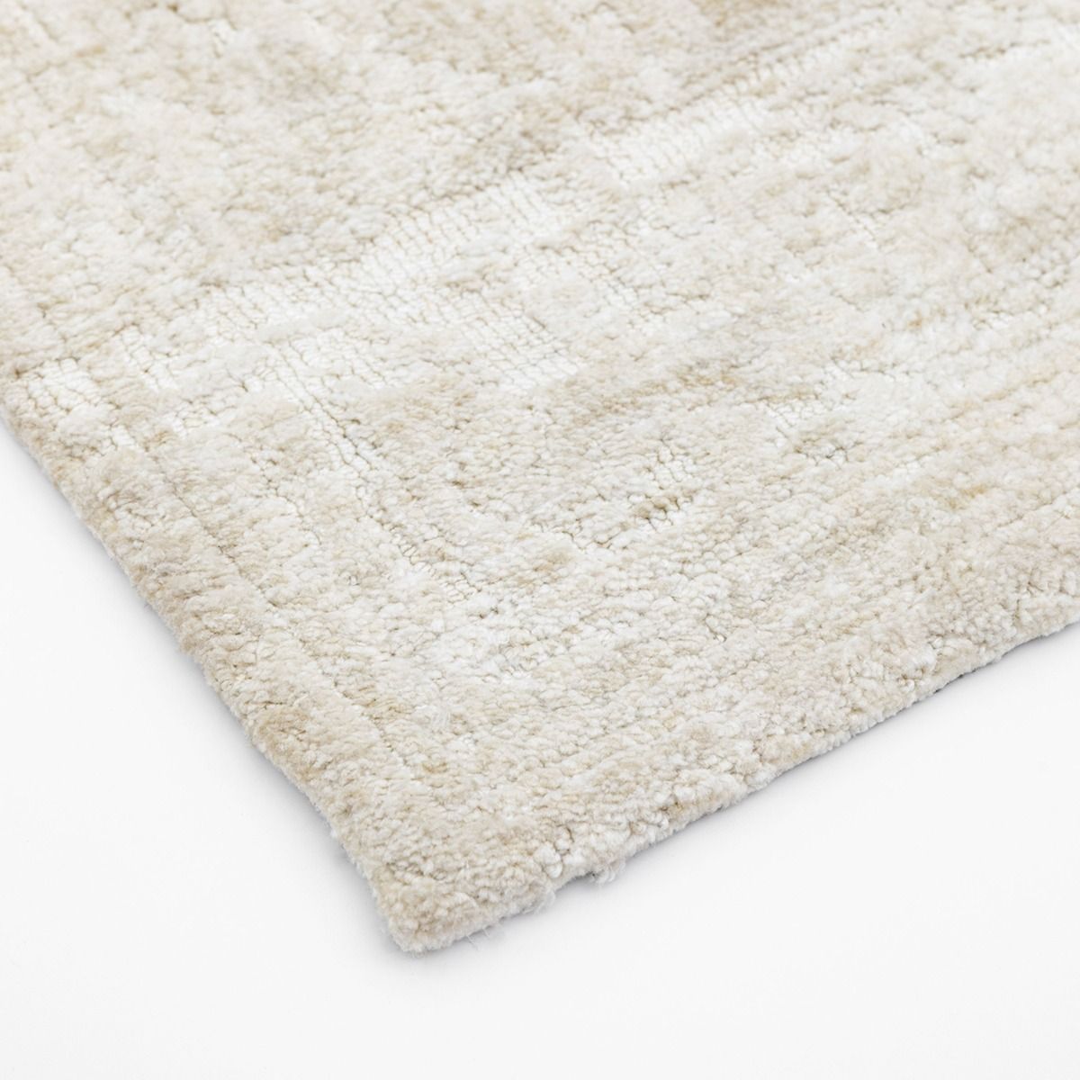 Cream rug with subtle pattern