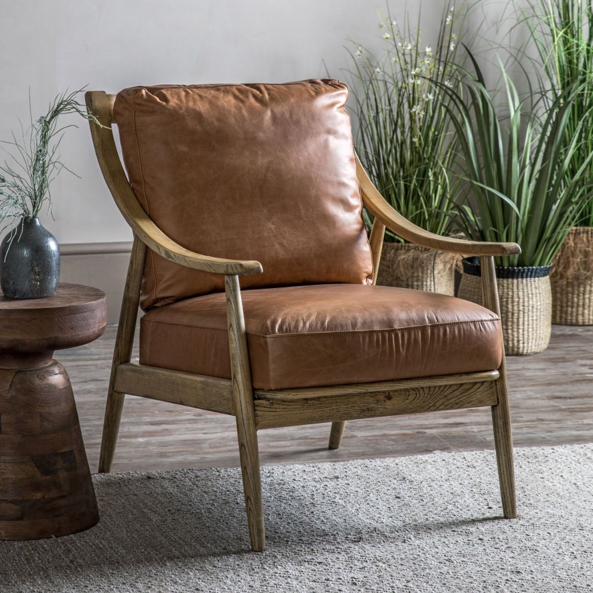 Brown leather mid-century style armchair