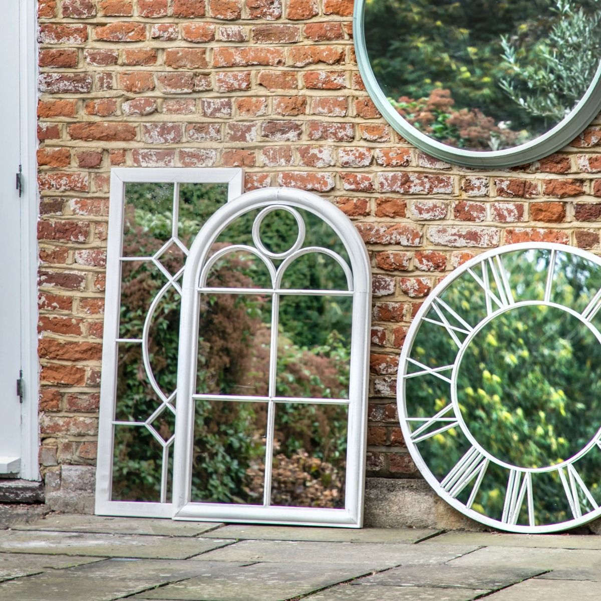 Enhance your outdoor space with the Rainham Outdoor Mirror in white. Stylish and weather-resistant, it adds elegance and depth to any garden or patio.