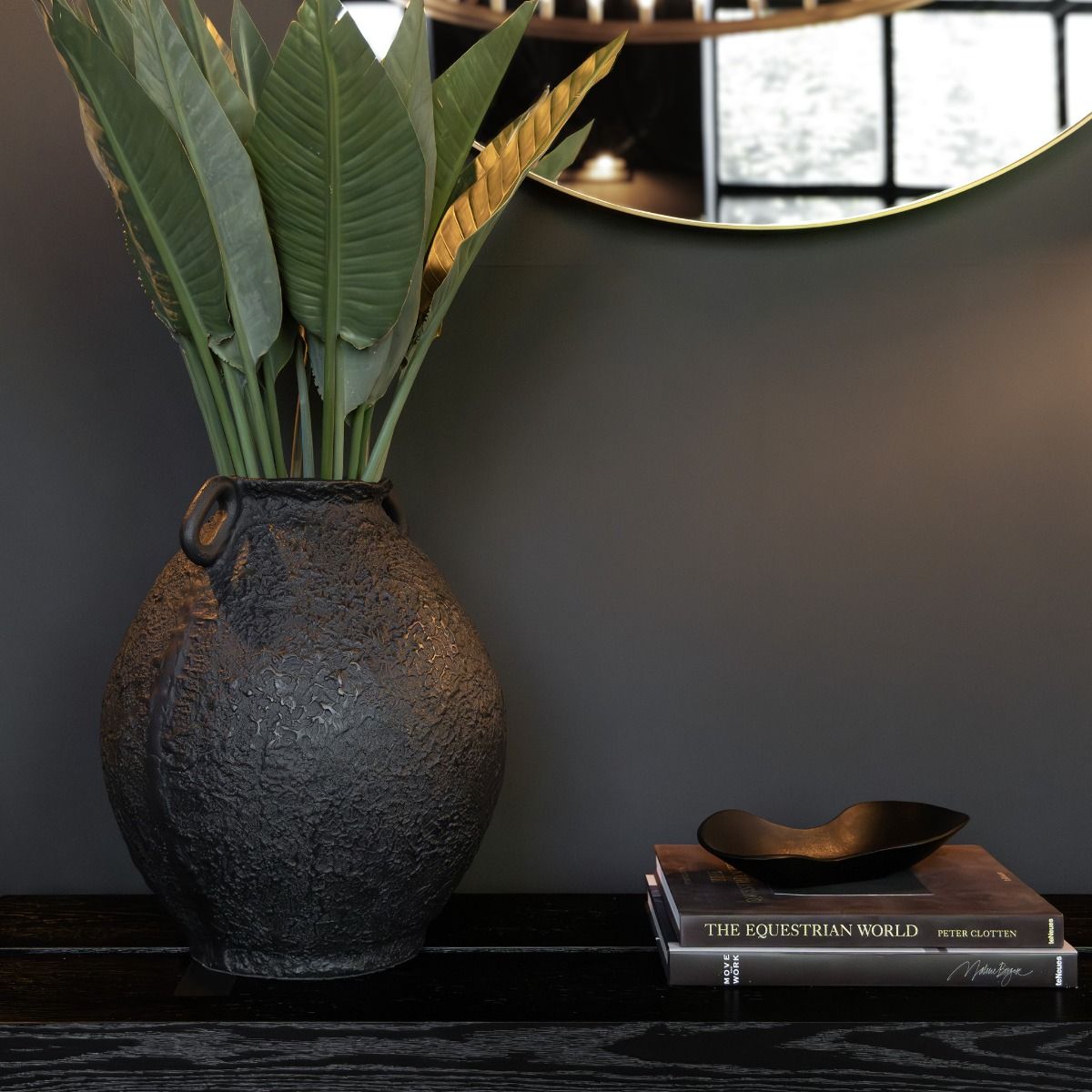 Classic black metal urn with small handle details