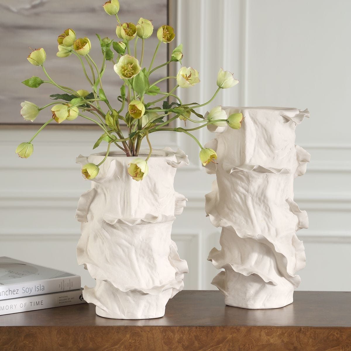 Elevate your decor with the Ripple Crest White Vases set! Perfect for flowers or as stunning standalone pieces. Stylish and versatile for any space.