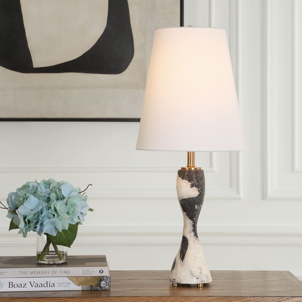 Illuminate your space with the Gallus Spheres Table Lamp, featuring a stunning design that blends modern elegance with warm ambiance for any decor.