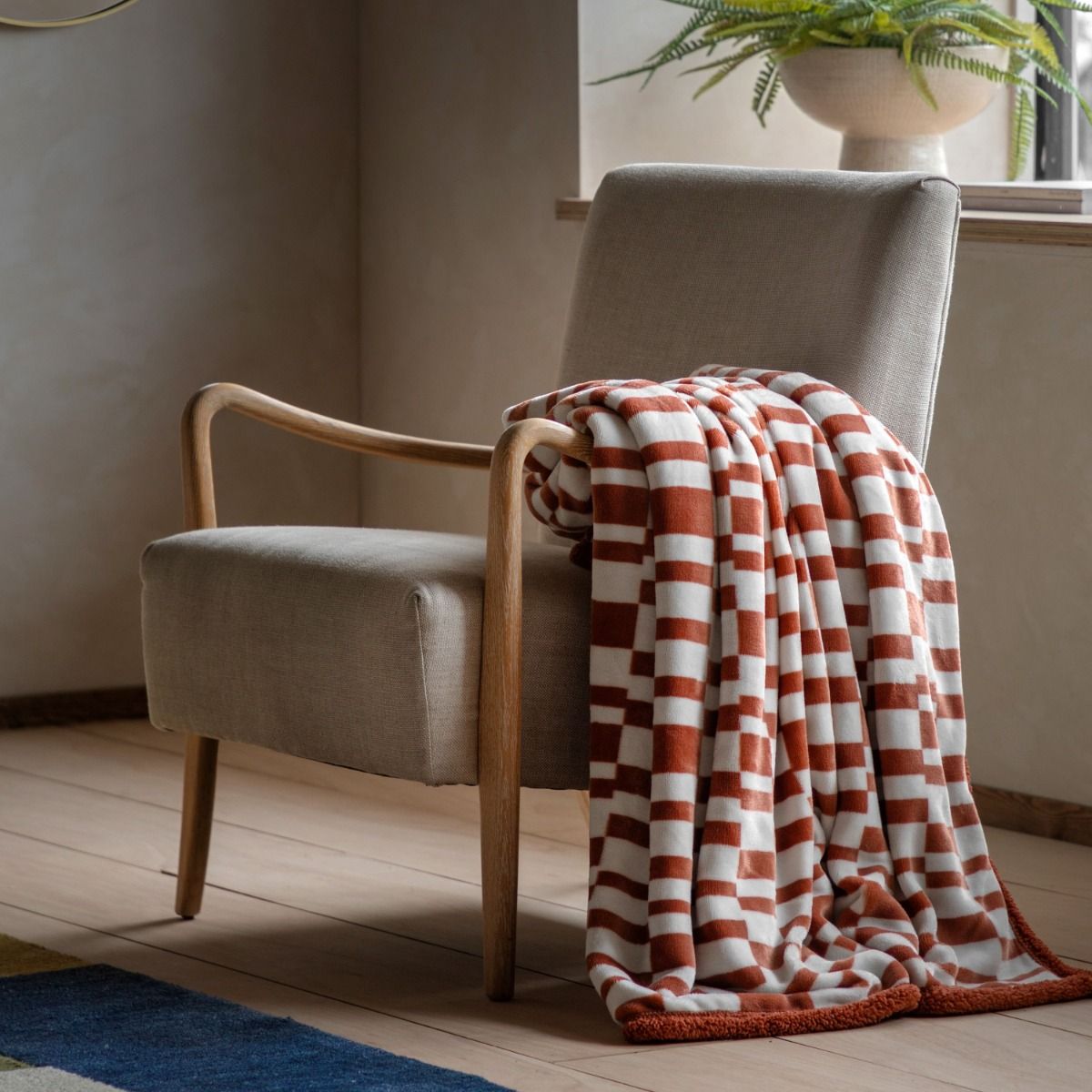 Cozy up with the Shiloh Throw in Nutmeg. Soft, stylish, and perfect for any decor, it adds warmth and comfort to your space.