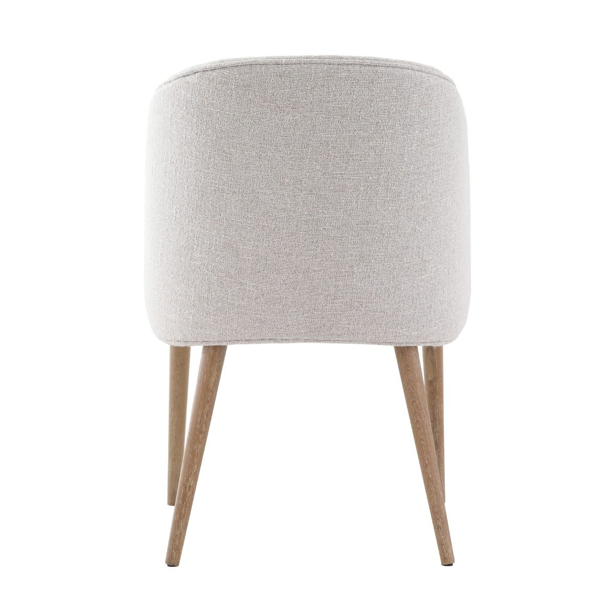 The Eton Dining Chair, with its curved upholstered back, soft linen fabric, and solid oak frame, offers modern comfort and Scandinavian-inspired style for everyday dining.