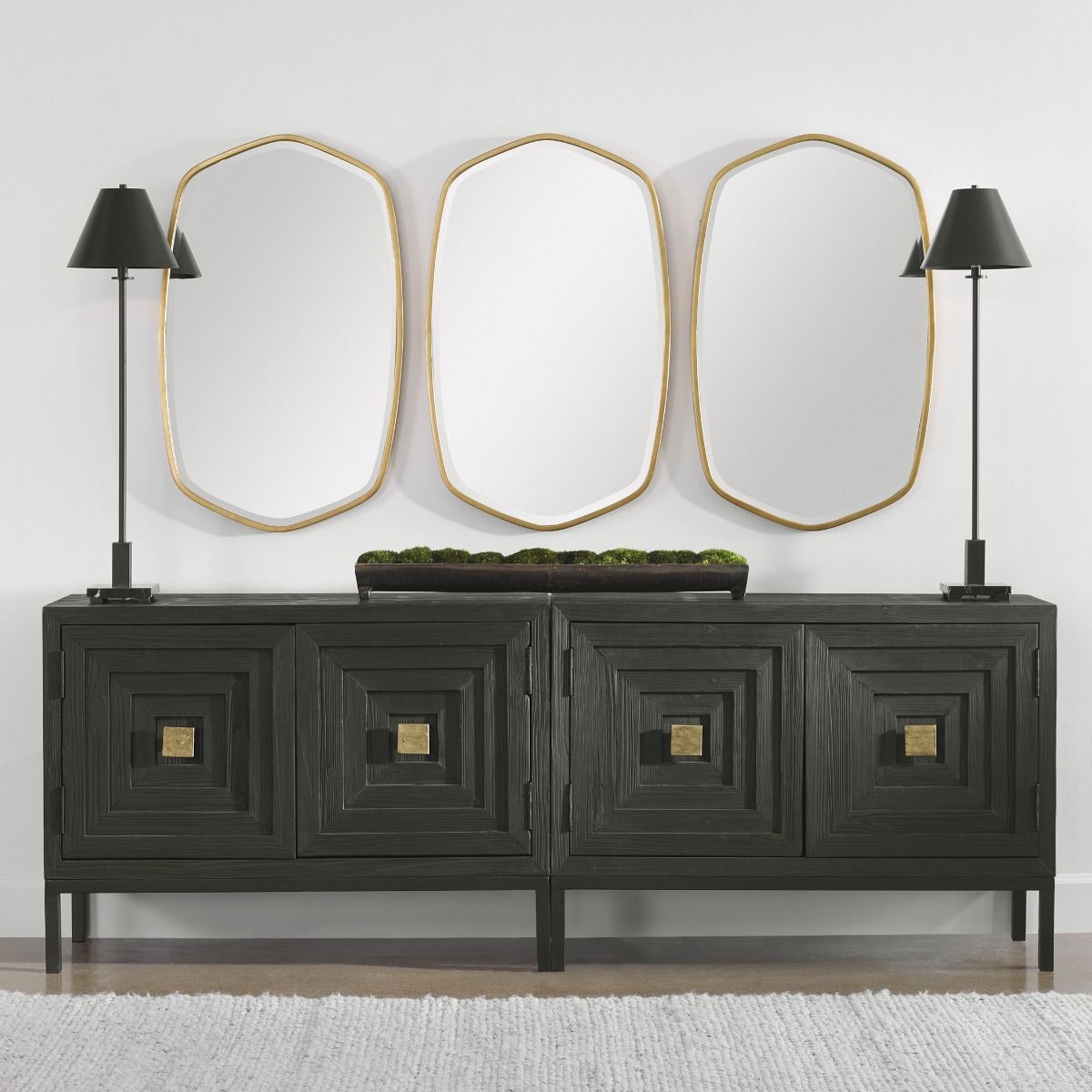 A gorgeous wall mirror by Uttermost with a golf leaf finish