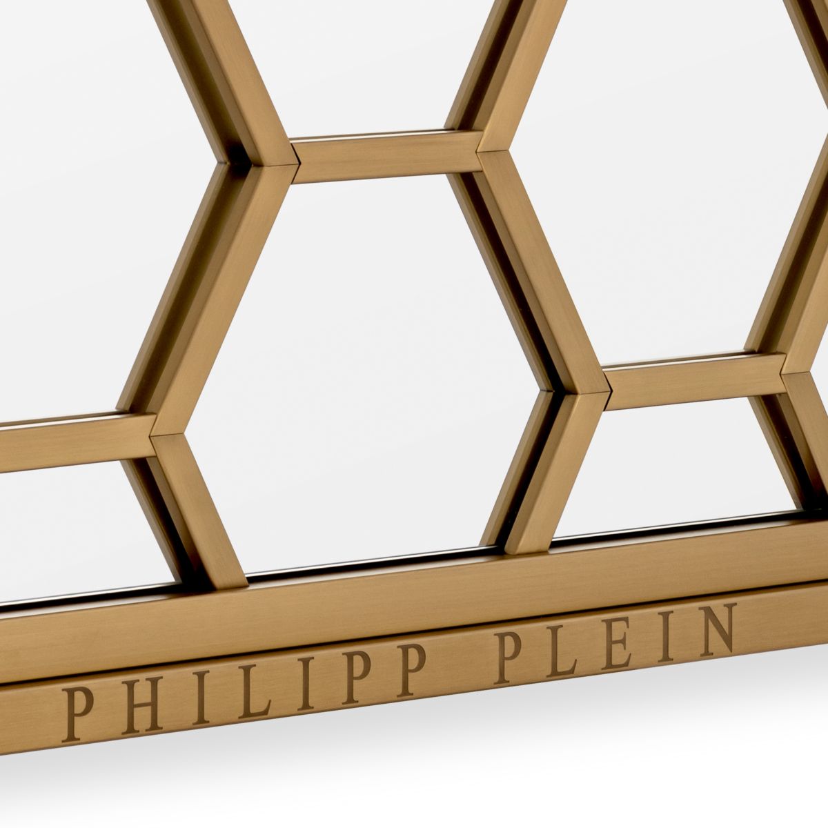 brass framed mirror with geometric design