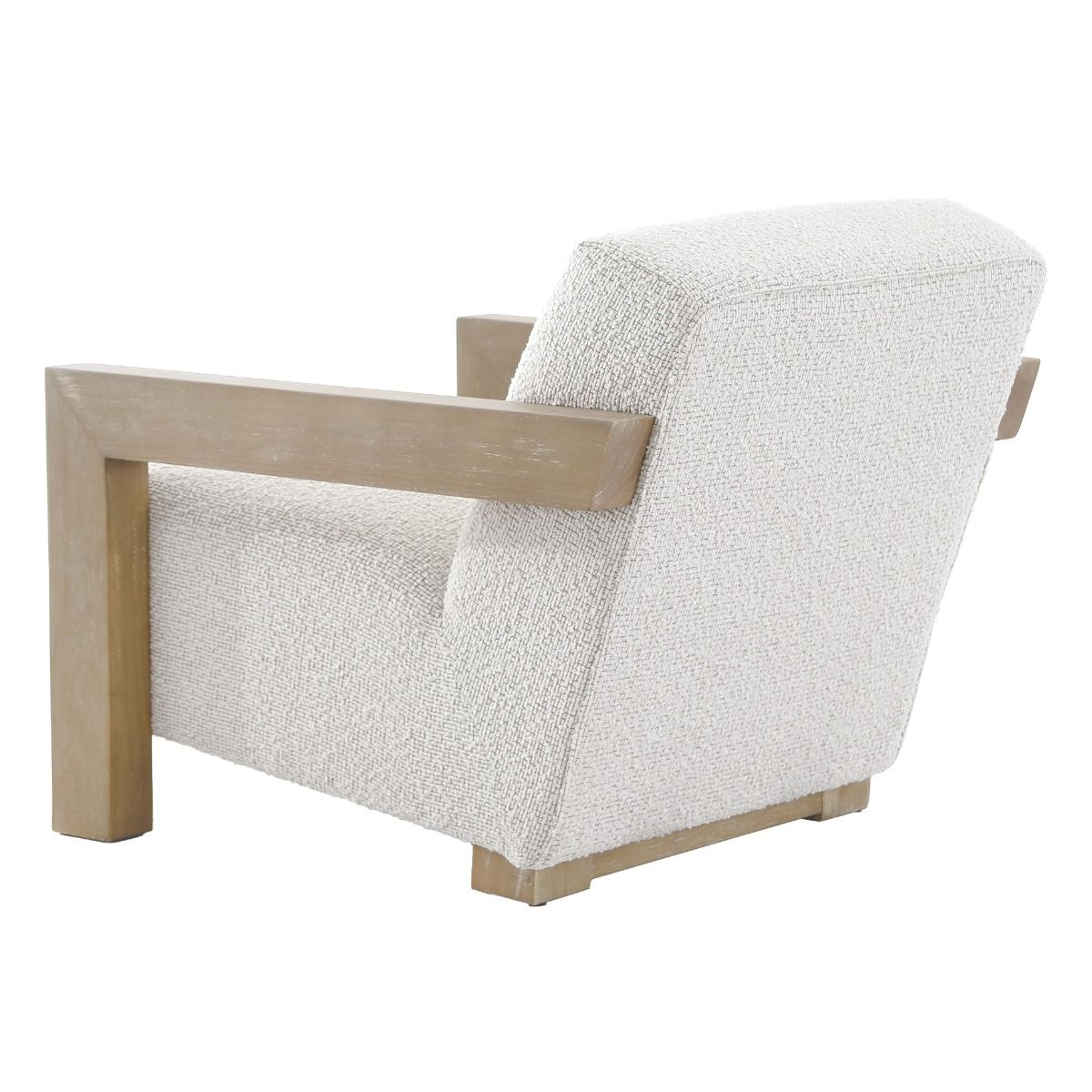 The Abbey Accent Chair, with its solid oak frame and plush cream boucle upholstery, offers both comfort and elegance, making it the perfect addition to any living room.