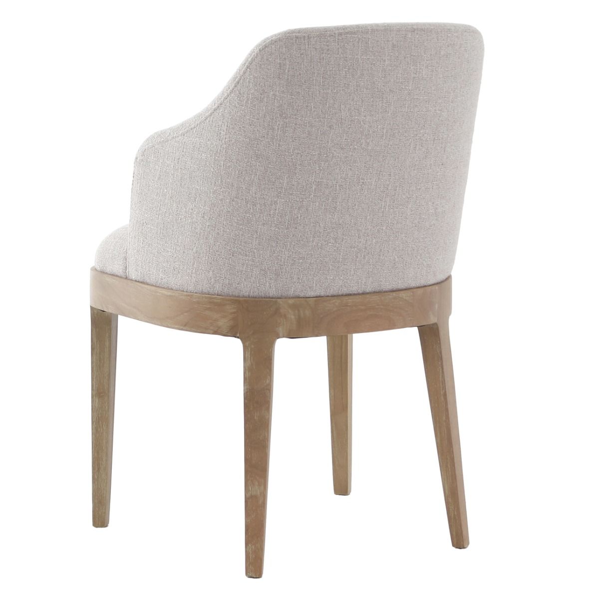 The Kingham Dining Chair features a solid oak frame, exposed seat, and luxurious linen upholstery, offering a timeless and elegant choice for everyday dining.