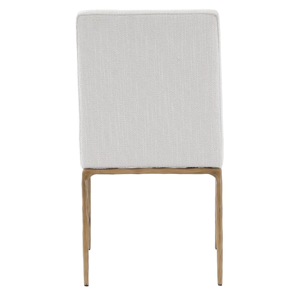 The Sloane Dining Chair, with its brass gold metal legs and off-white C0 fabric upholstery, effortlessly adds a chic mid-century modern touch to any dining space.