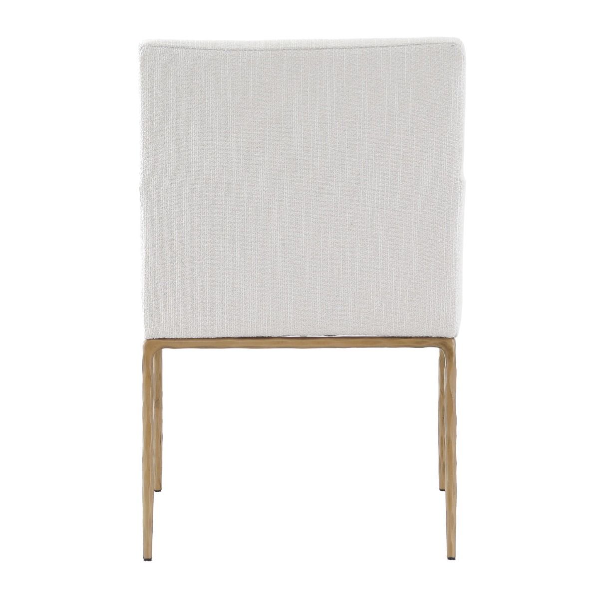 The Sloane Dining Armchair combines mid-century modern elegance with forged brass gold legs and off-white C0 fabric upholstery, offering both style and comfort.