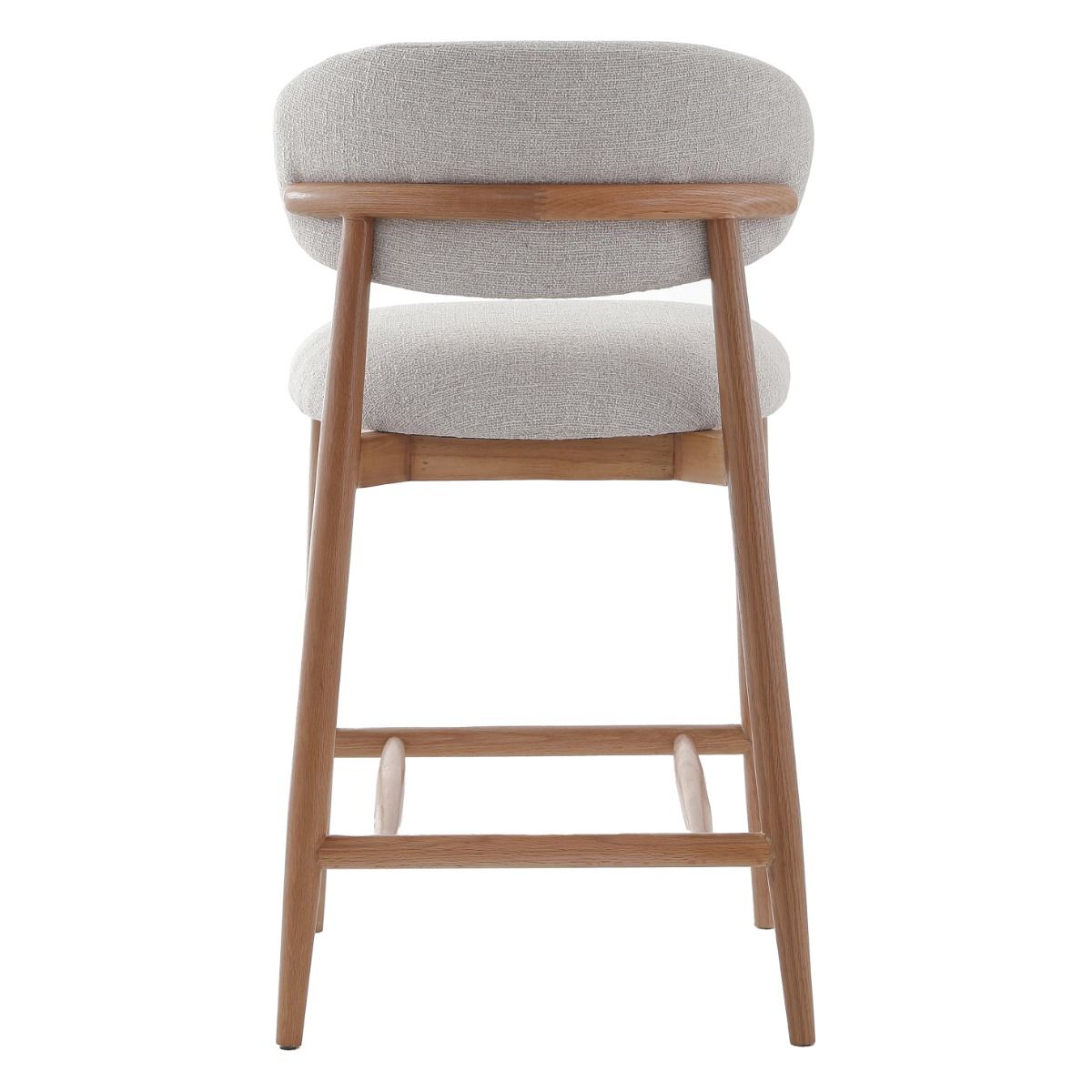 The Blockley counter stool, with its sleek curves, premium linen upholstery, and solid oak frame, adds modern style and durability to any kitchen, complemented by a matching Dining Chair.