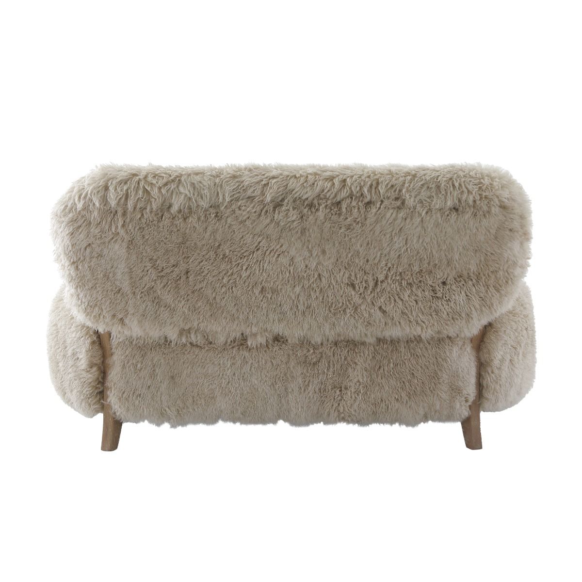 Upholstered in luxurious sheepskin with curved oak arms, the Baaarb Sofa adds a refined yet edgy touch to any modern interior and pairs perfectly with the Baaarb Accent Chair and Ottoman.