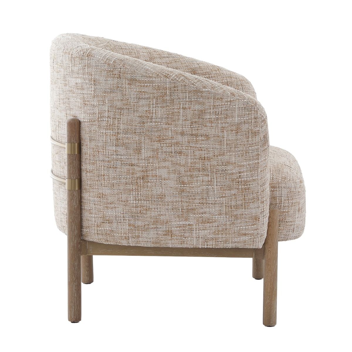 The Banbury Accent Chair, with its curved upholstered back, brass detailing, and natural linen fabric, adds refined elegance to any interior.