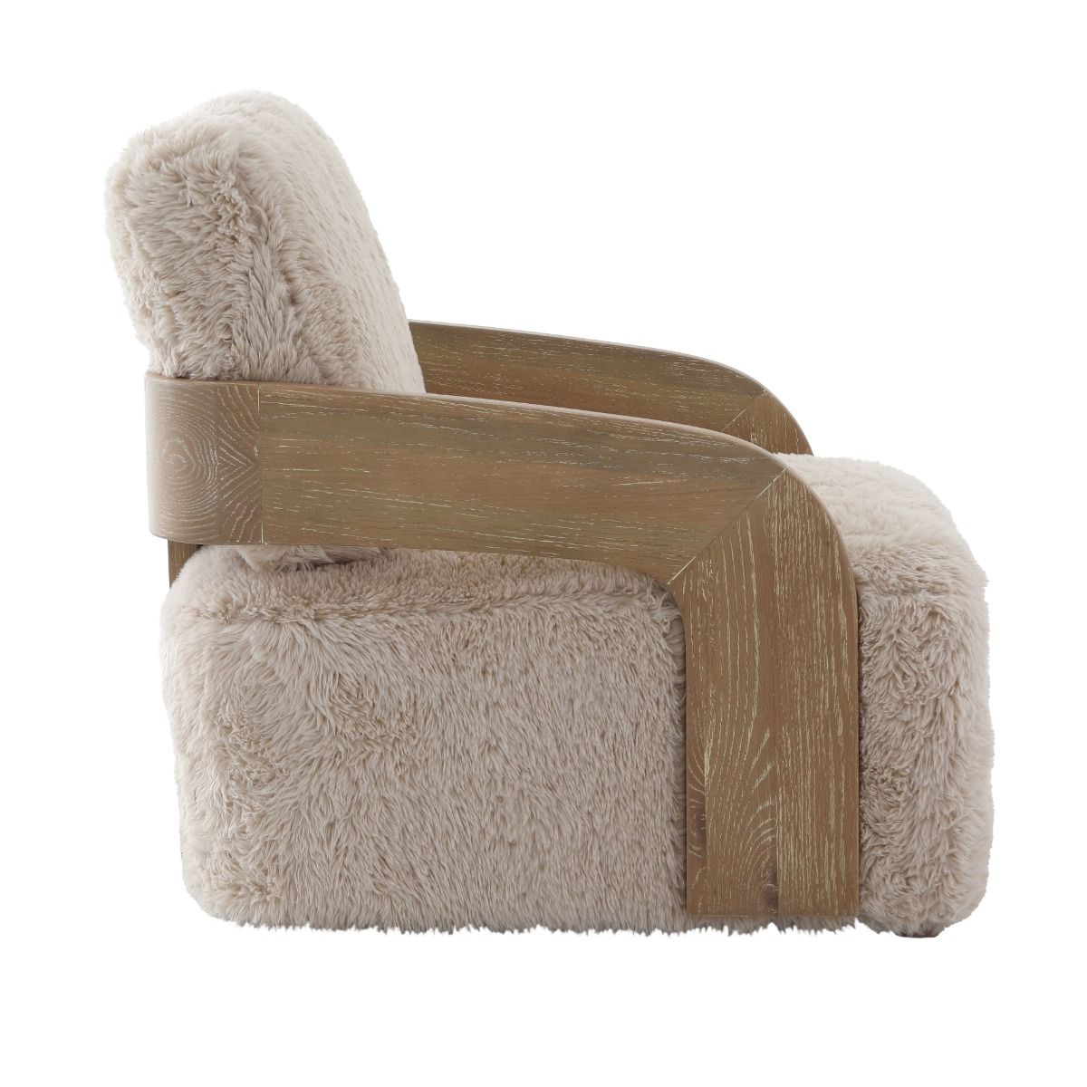 The Winnie Accent Chair, with its solid oak frame and sand-coloured faux fur upholstery, offers a cocoon of comfort and refined elegance