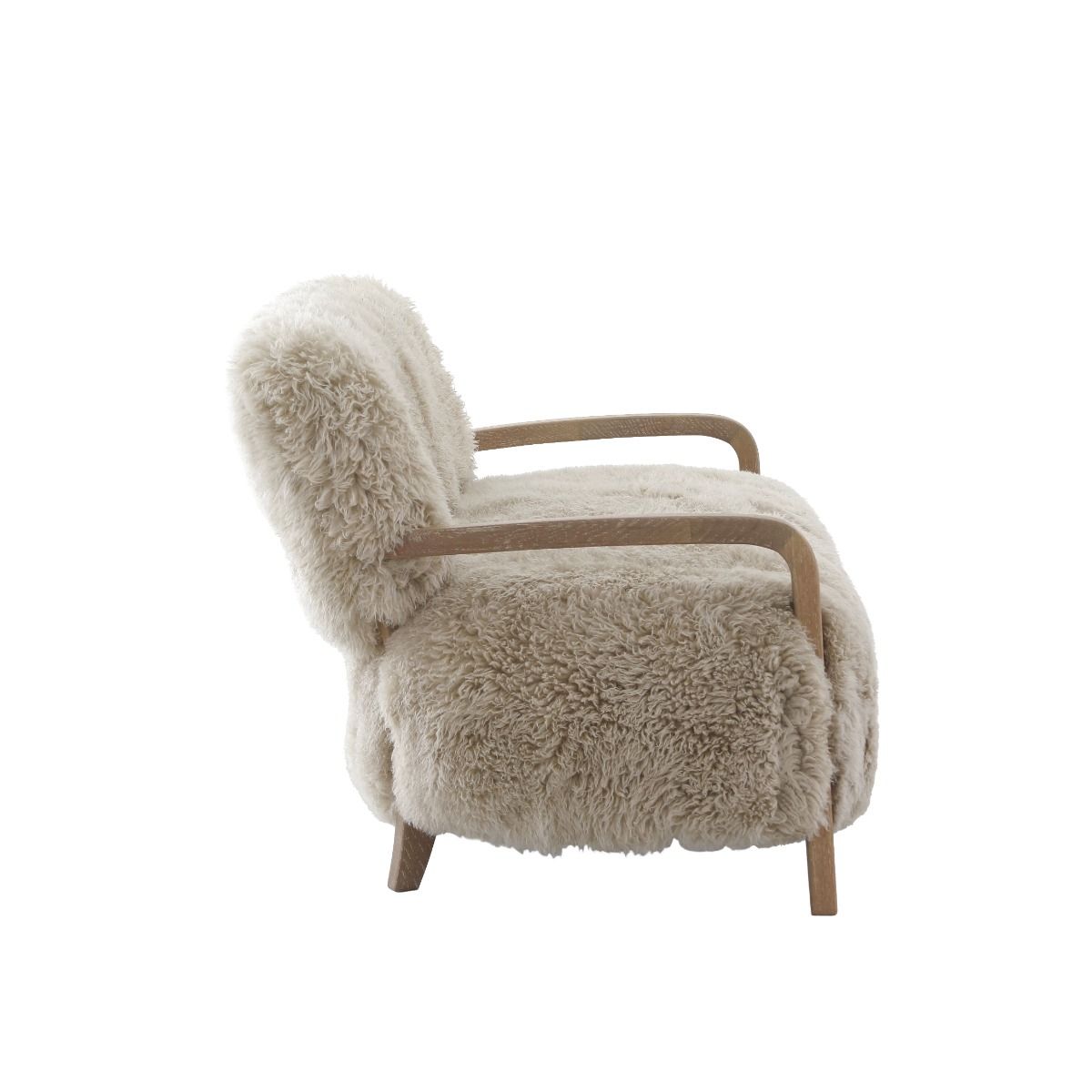 Upholstered in luxurious sheepskin with curved oak arms, the Baaarb Sofa adds a refined yet edgy touch to any modern interior and pairs perfectly with the Baaarb Accent Chair and Ottoman.