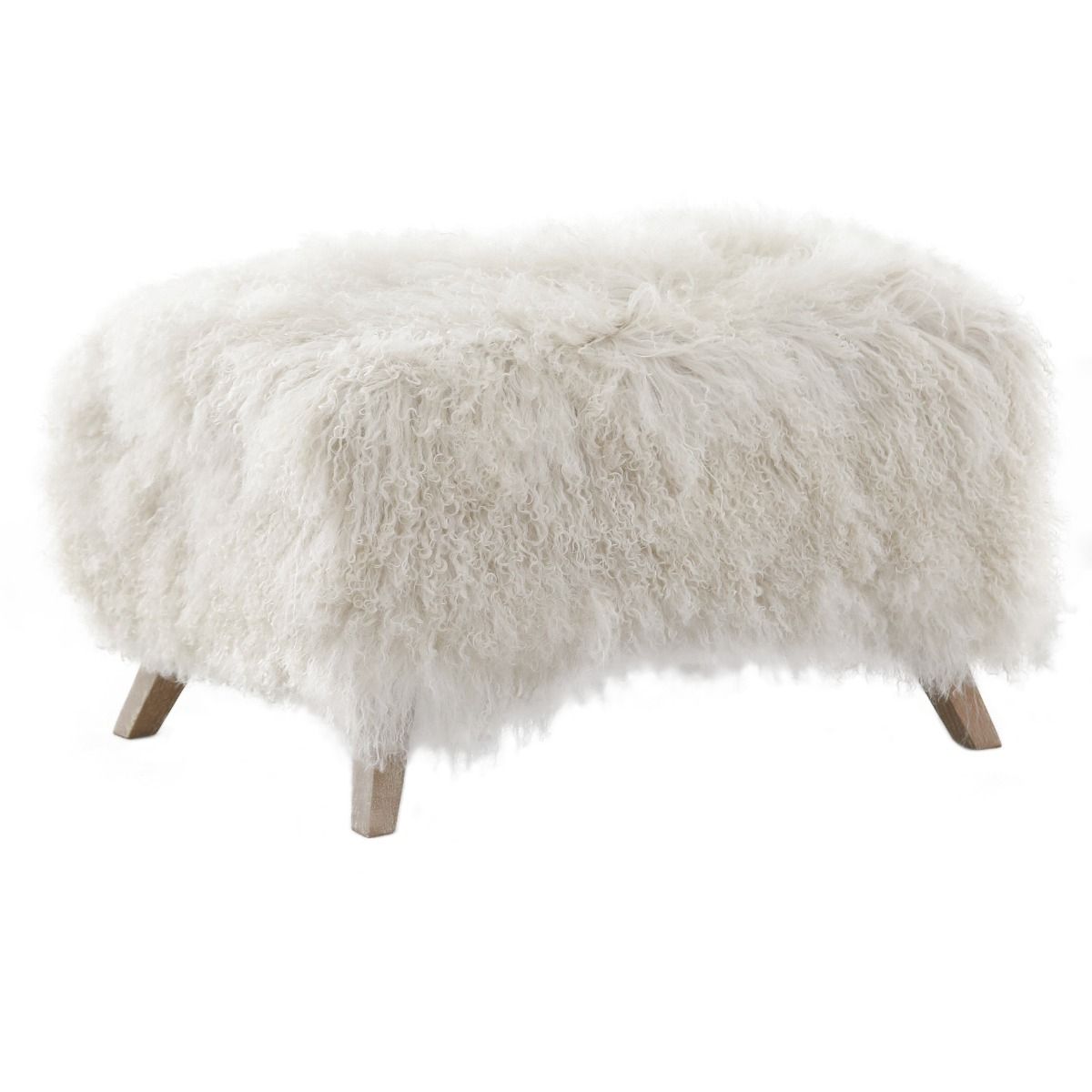 The Baaarb Ottoman by Keiichi, with solid oak legs and luxurious cream sheepskin, effortlessly complements the Baaarb Sofa or Accent Chair, adding warmth and character to any interior.