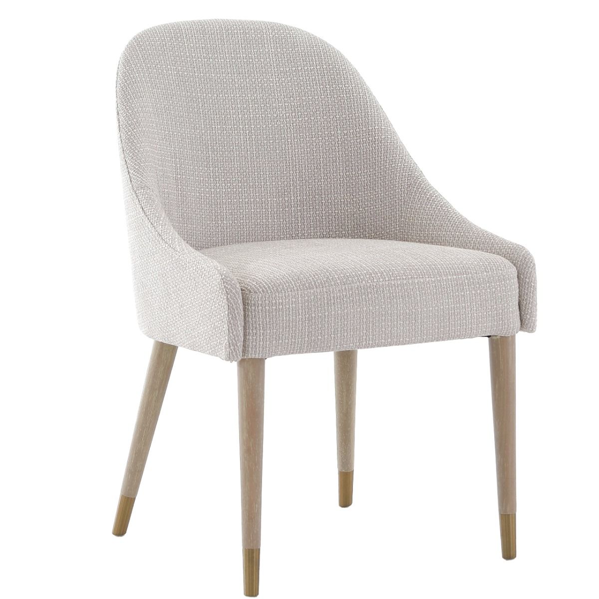 The Bibury Dining Chair features sleek sloped arms, a rounded frame, and solid wood legs with brass golden caps, providing both comfort and style.