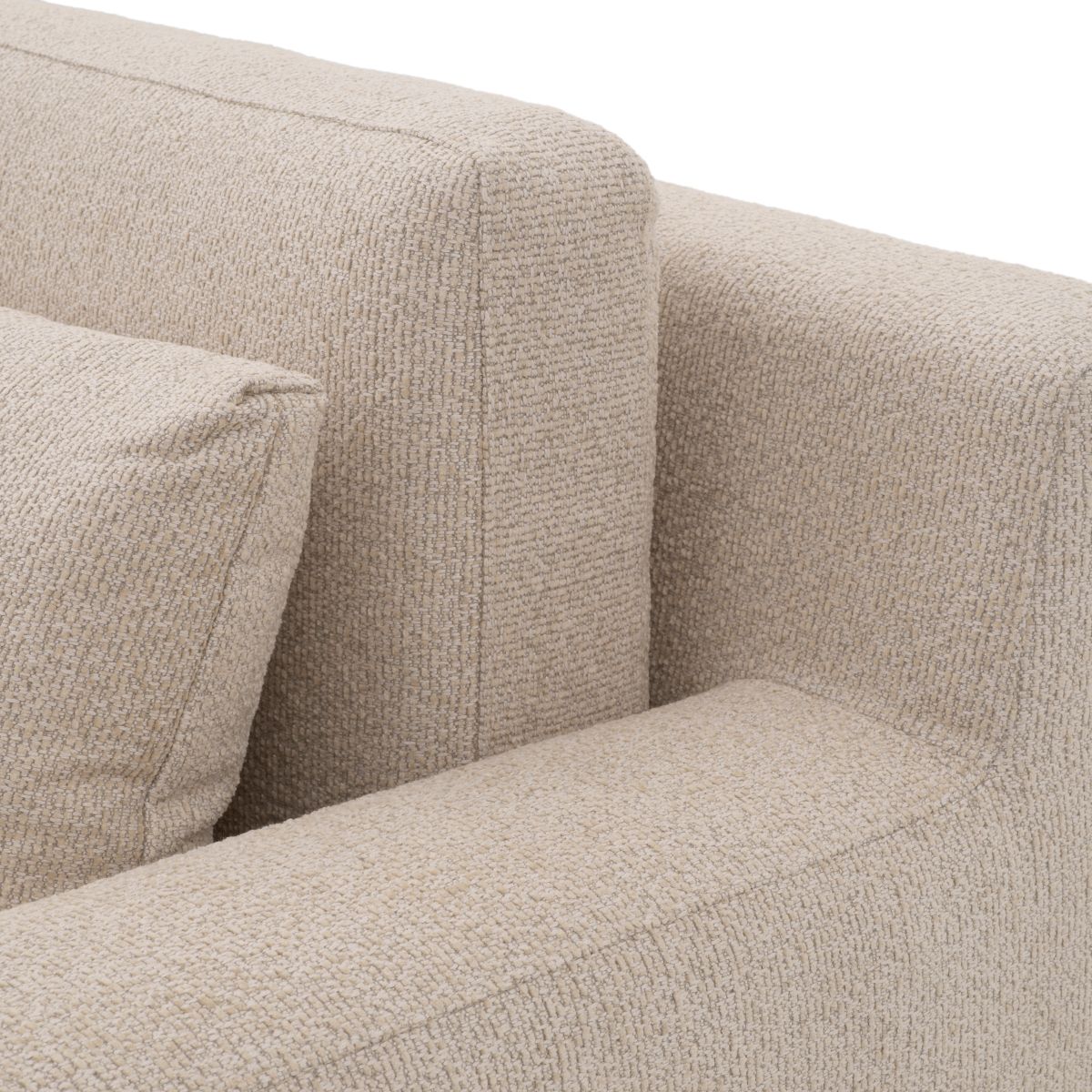 A sumptuous sofa with a luxury beige upholstery