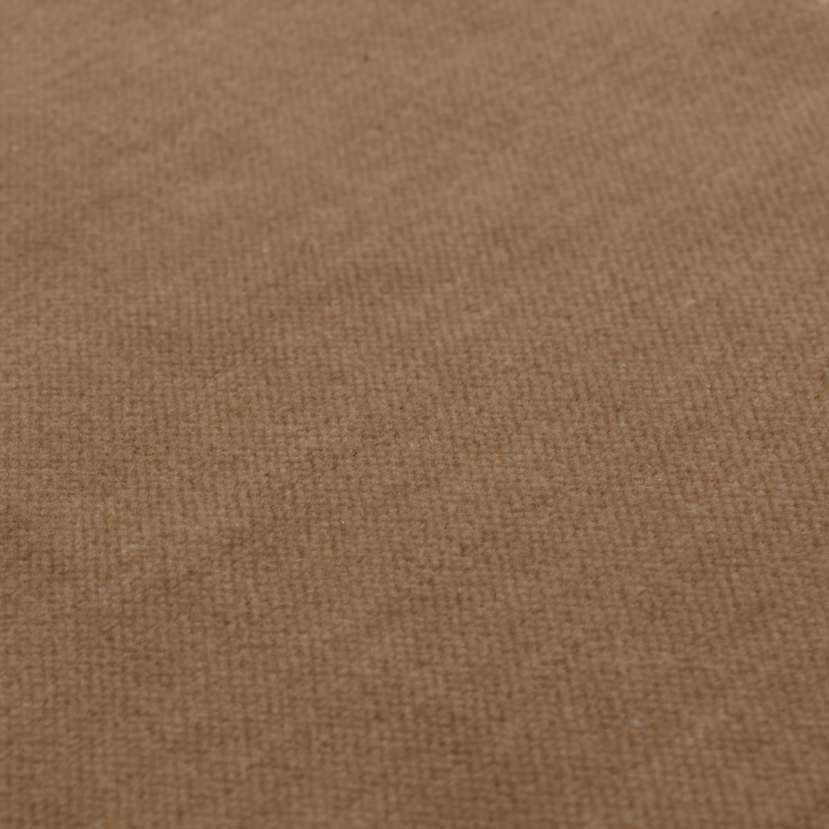 A classic dining chair with a camel velvet upholstery