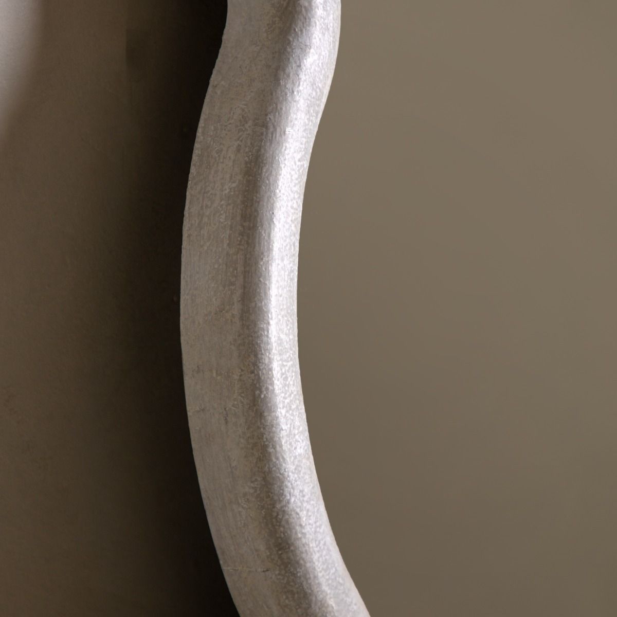Full length mirror with a wavy edge detailing