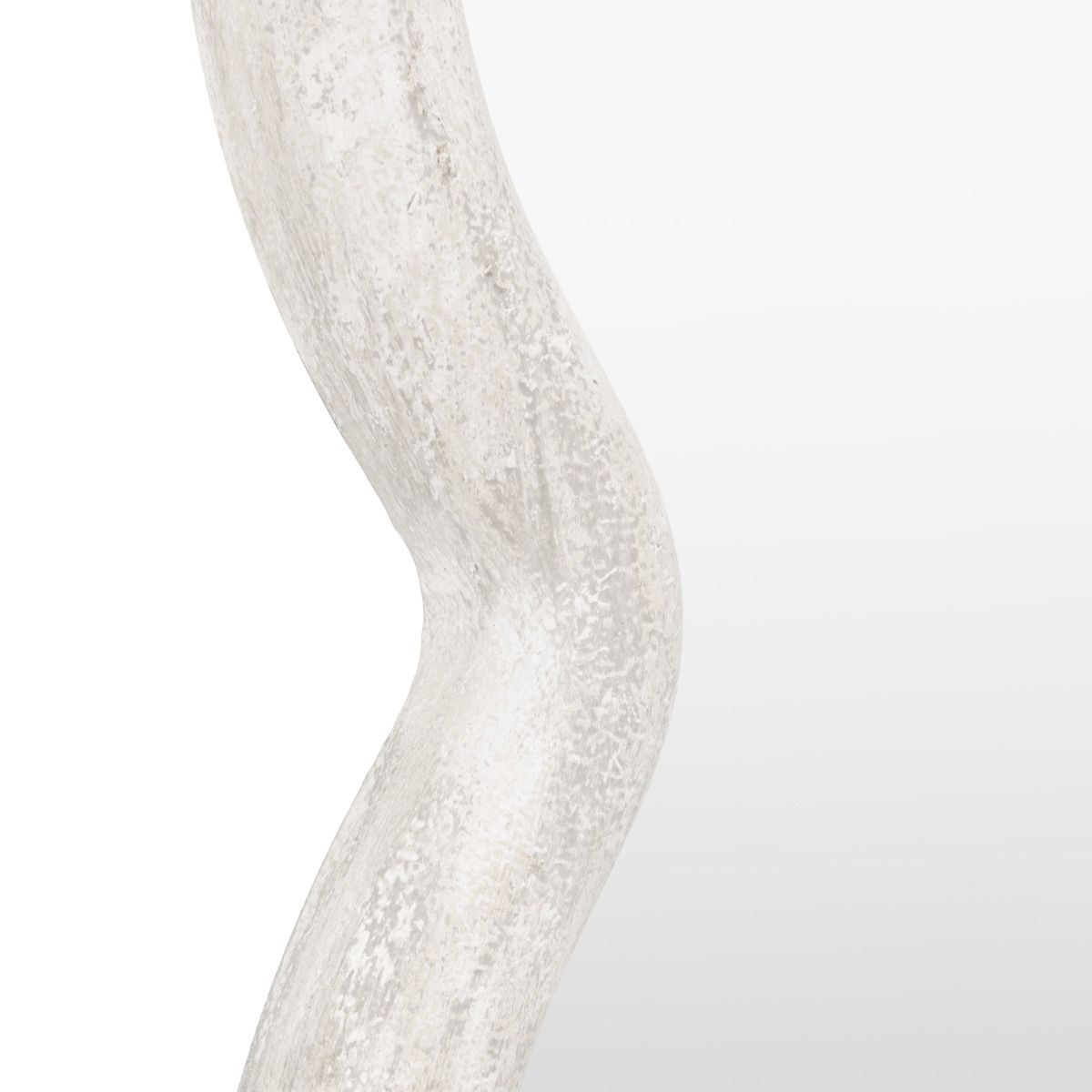 Wall mirror with a wavy edge detailing