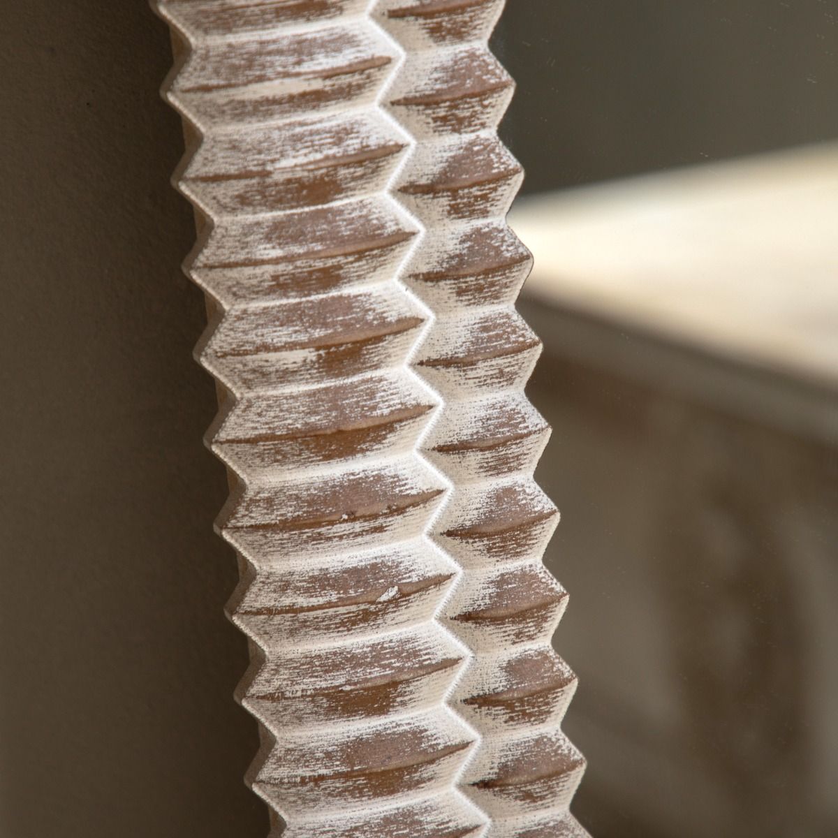 Whitewashed leaner mirror with intricate etching