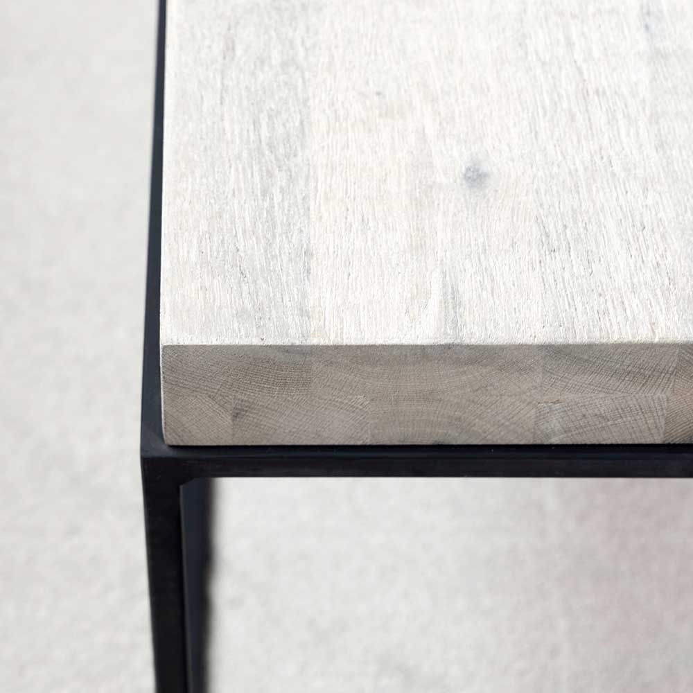 Rectangular console table with black metal legs and wooden tabletop