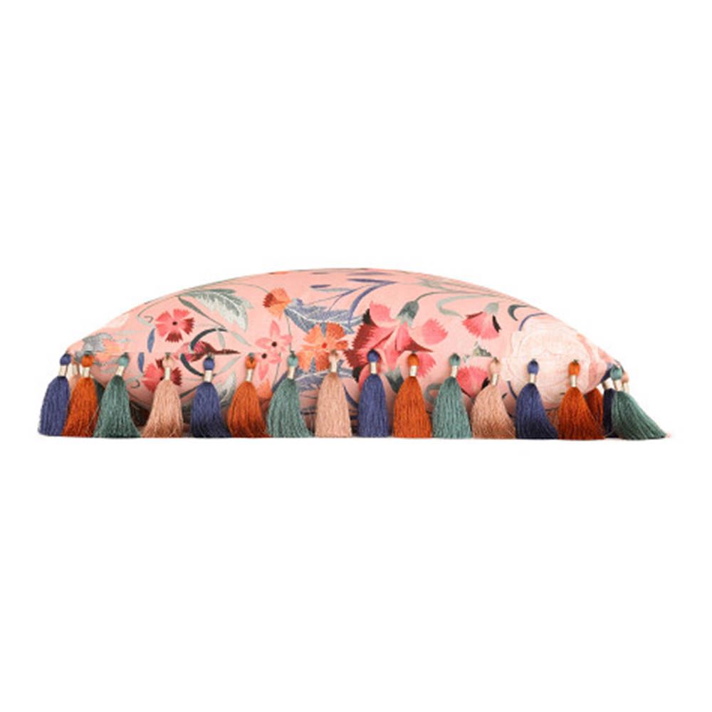 multicoloured cushion with floral pattern and tassels