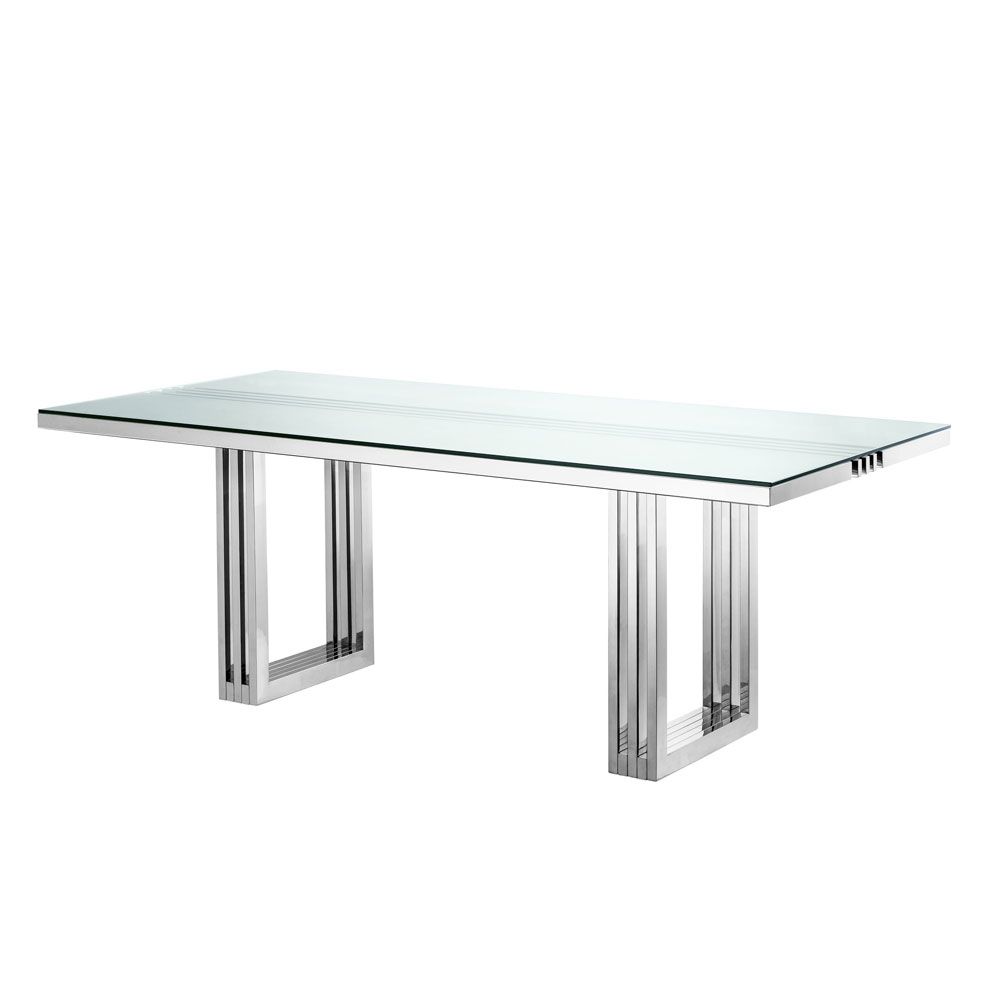 contemporary dining table with transparent surface and stainless steel frame