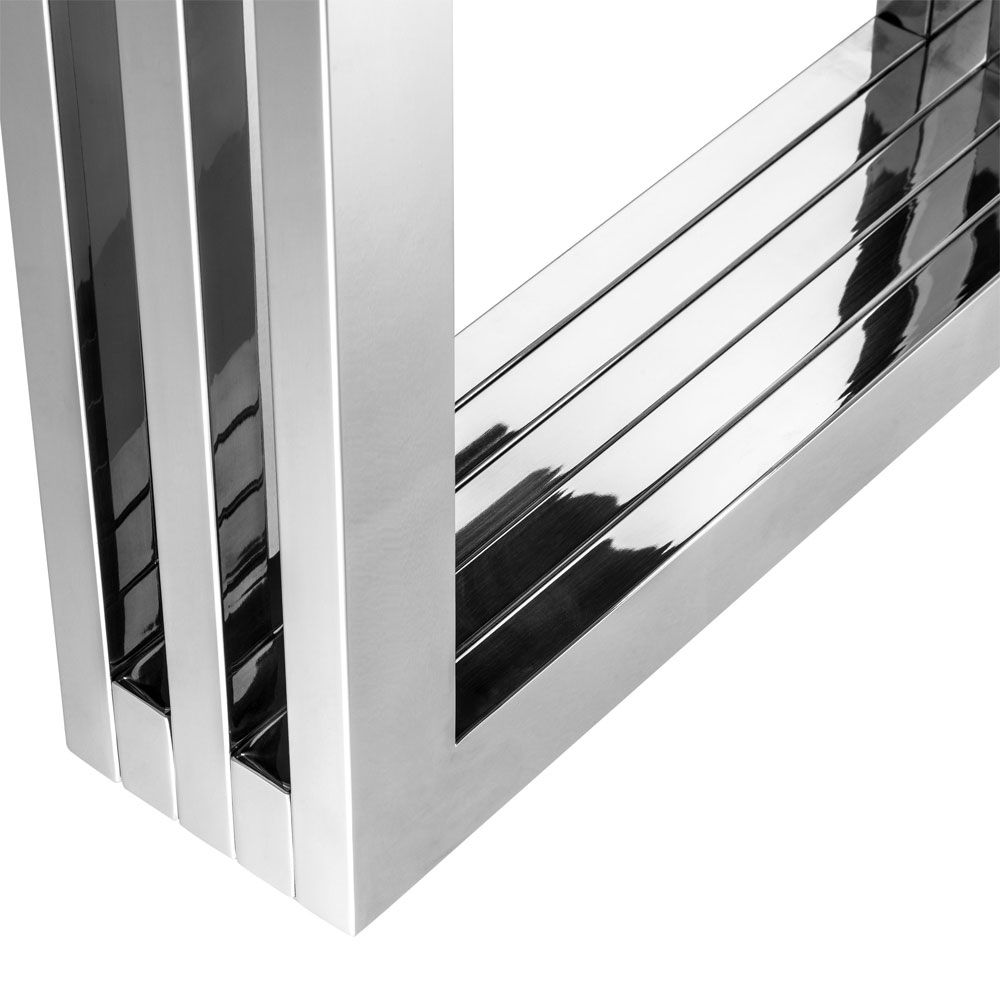 contemporary dining table with transparent surface and stainless steel frame