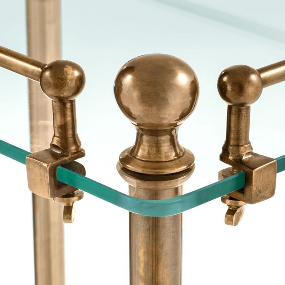 A three-tier bathroom rack with an iron vintage brass finish by Eichholtz 