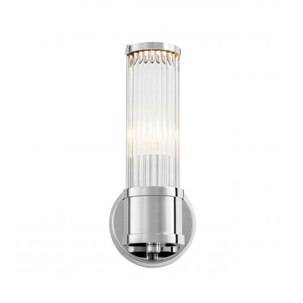 A gorgeous wall lamp with a  finish and clear reeded glass